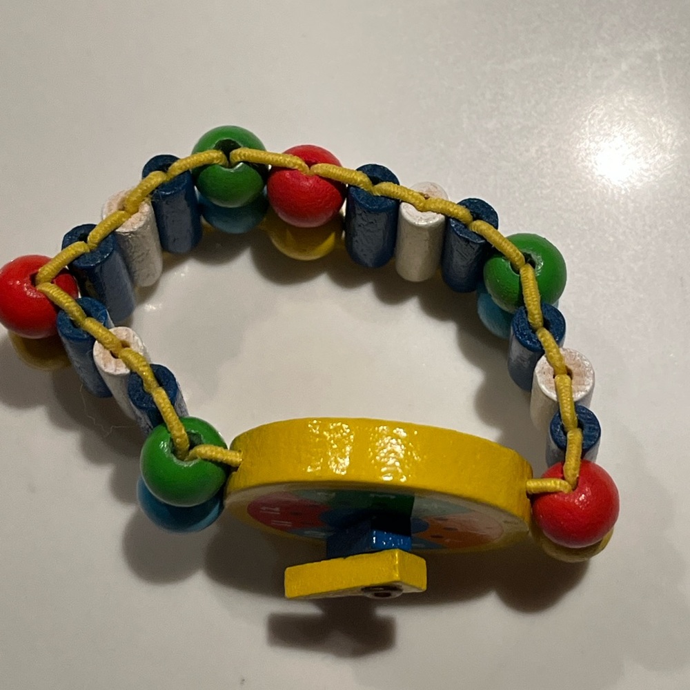 Elastic wooden tatiri watch for kids.  Helps teach kids how to read time. - Picture 6 of 8